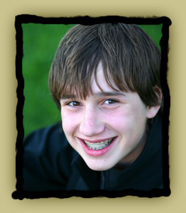 stock photo of a teen boy with braces