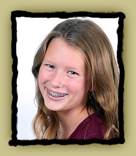 stock photo of a teen girl with braces